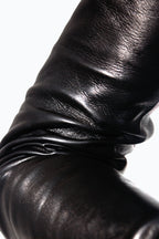 Crease detail of shoulder length leather gloves by Ines