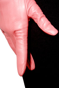 Closeup of pink unlined short leather gloves by Ines Gloves