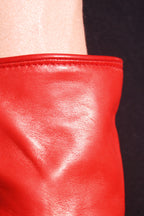 Stitching detail of red leather gloves lined with red cashmere by Ines Gloves