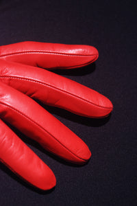 Fingers of red leather gloves lined with red cashmere by Ines Gloves